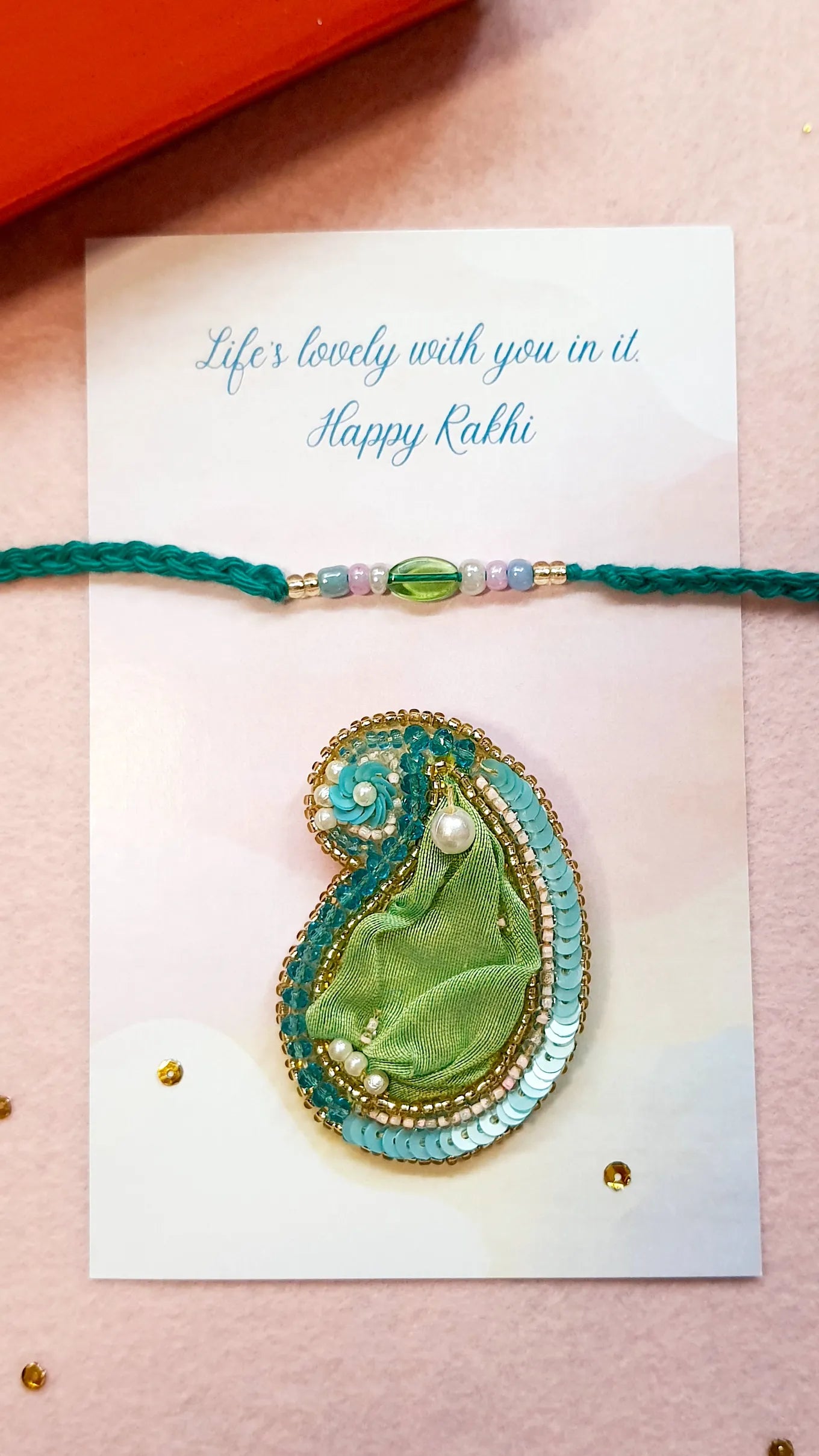 Emerald Rakhi & Amra Brooch