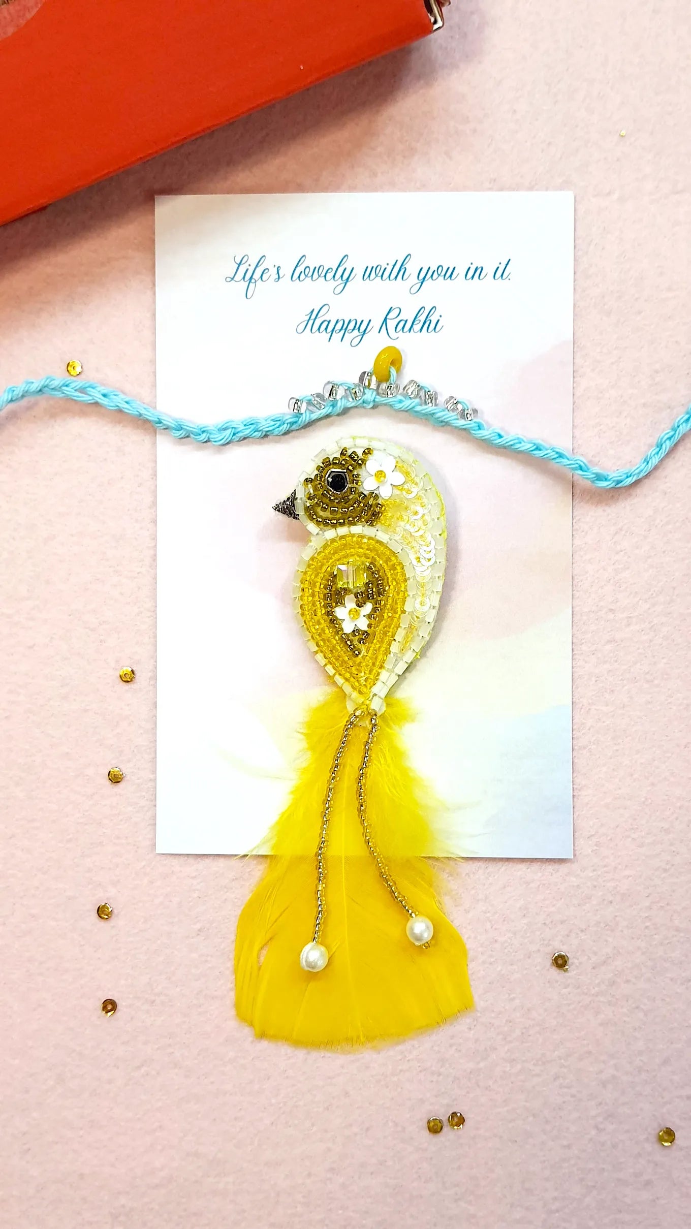 Crown Rakhi & Yellow Sparrow Brooch