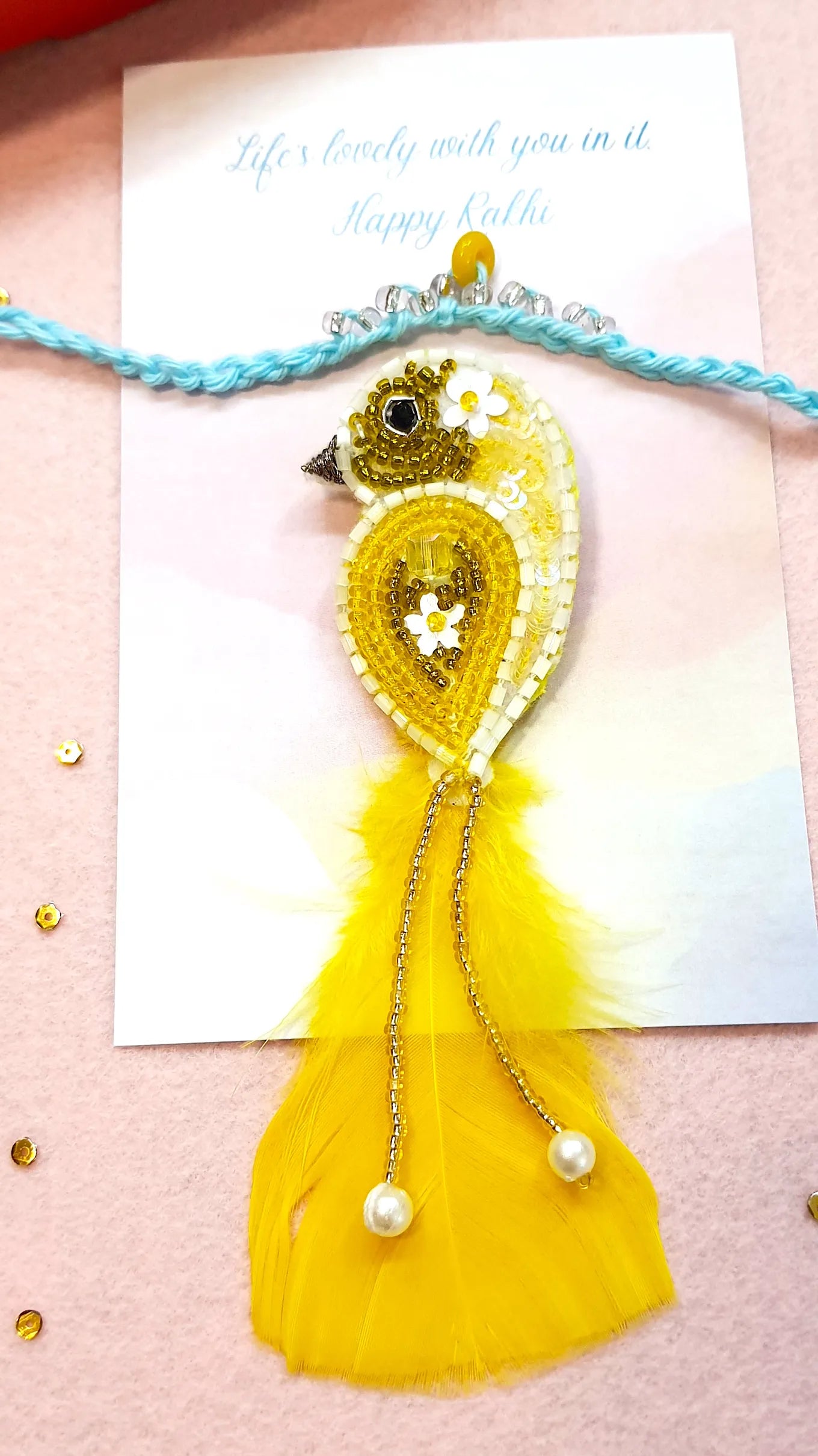 Crown Rakhi & Yellow Sparrow Brooch