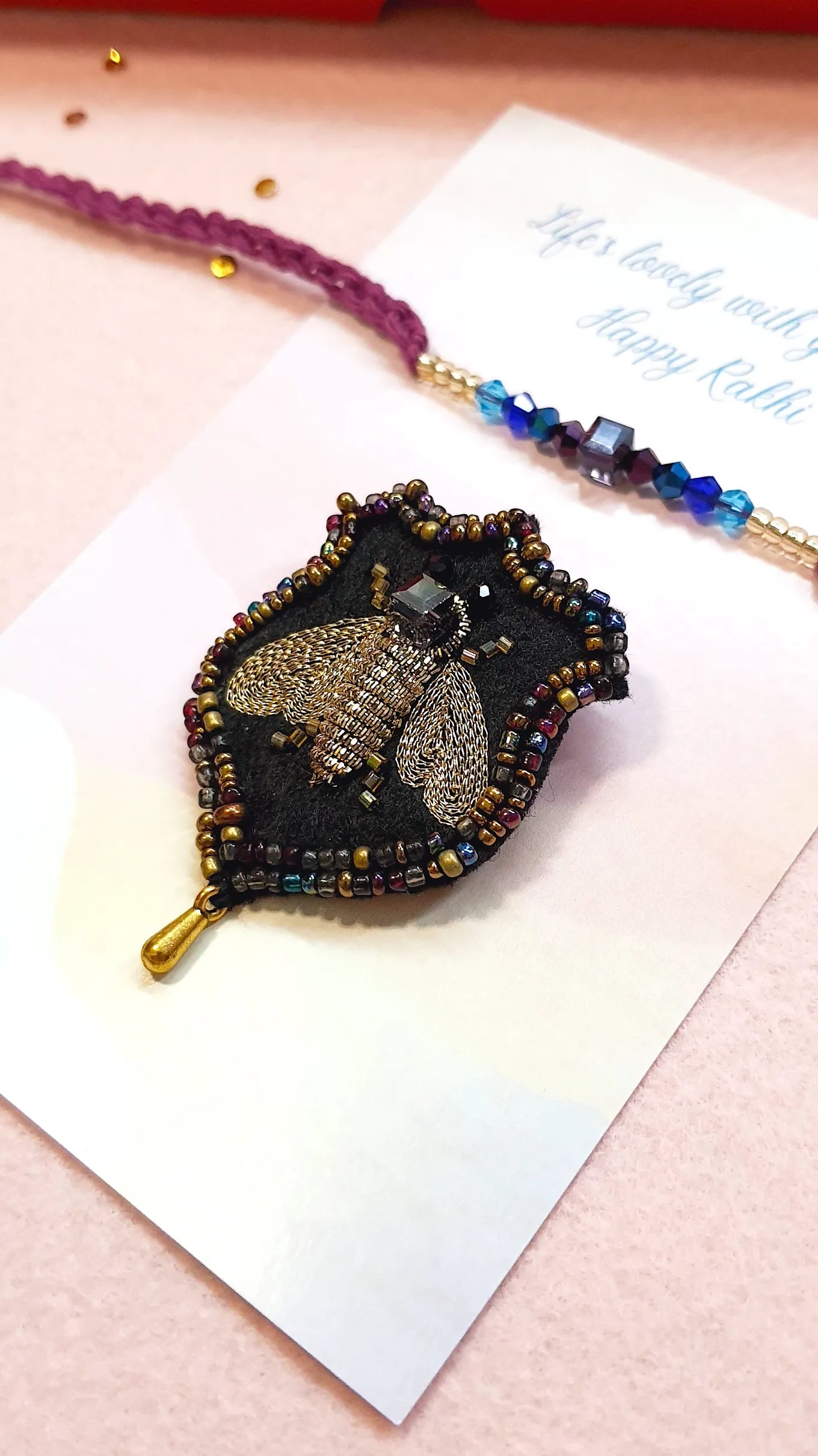 Blue Nile Rakhi & Cairo Bee Brooch