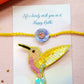 Phool Rakhi & Yellow Hummingbird Brooch