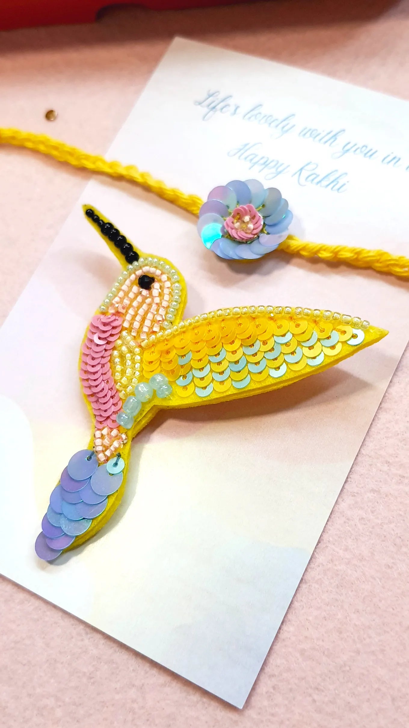 Phool Rakhi & Yellow Hummingbird Brooch