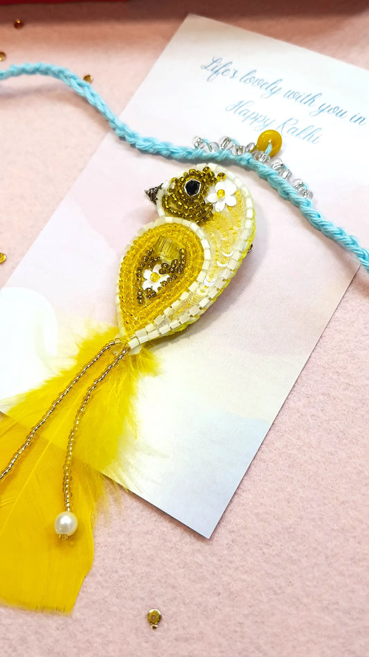 Crown Rakhi & Yellow Sparrow Brooch