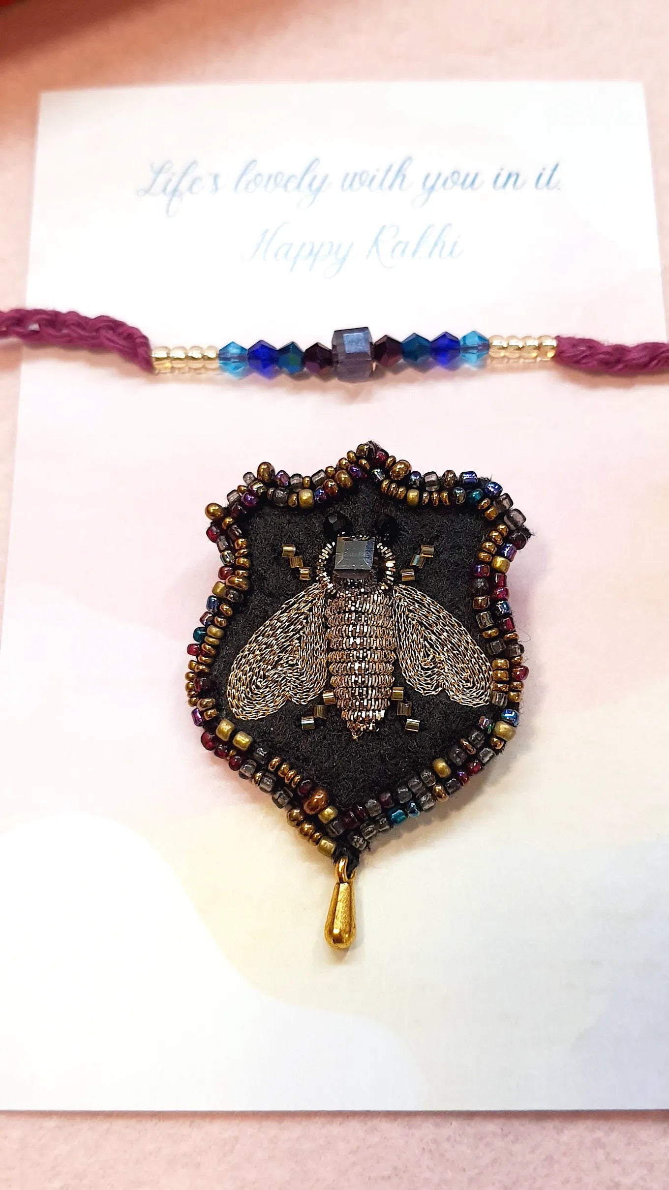 Blue Nile Rakhi & Cairo Bee Brooch